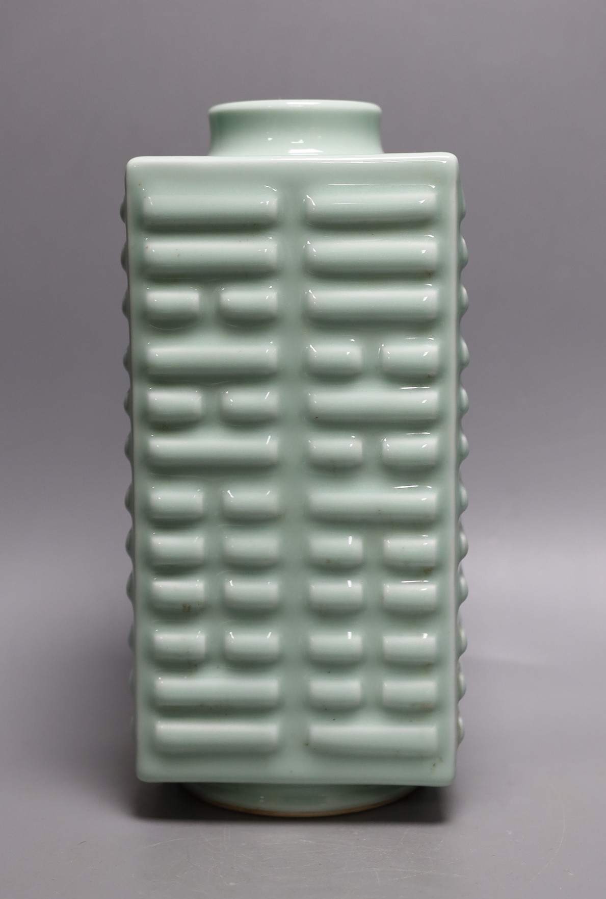 A Chinese celadon glazed cong form vase, Guangxu mark, 27cms high